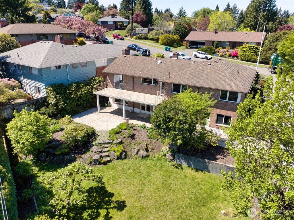 Photo of 10720 11 Avenue NW, Seattle, WA 98177 (MLS # 2515030)