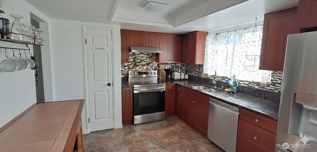 Photo of 7655 Forest Ridge Drive NE, Bremerton, WA 98311 (MLS # 2489587)