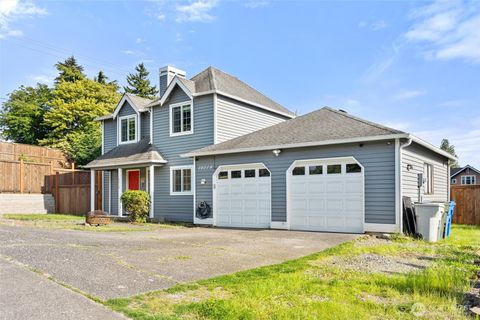 Photo of 10319 SE 228th St St, Kent, WA 98031 (MLS # 2381277)