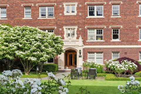 Photo of 100 W Highland Drive #404, Seattle, WA 98119 (MLS # 2386877)