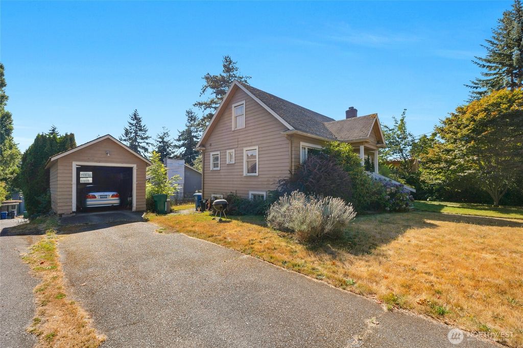 Photo of 9002 Corliss Avenue N, Seattle, WA 98103 (MLS # 2429289)
