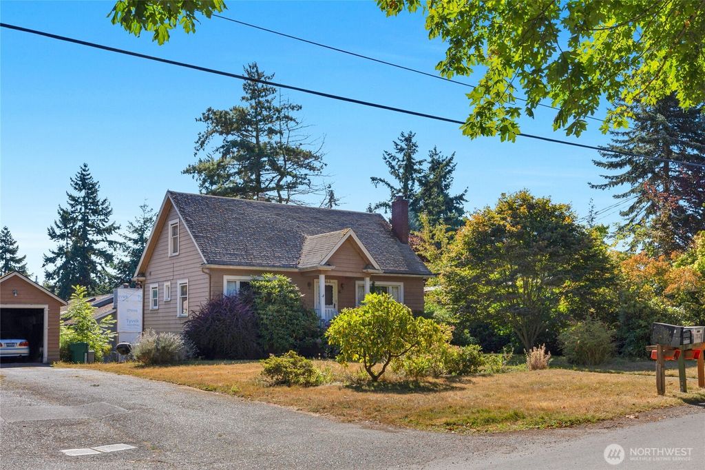 Photo of 9002 Corliss Avenue N, Seattle, WA 98103 (MLS # 2429289)