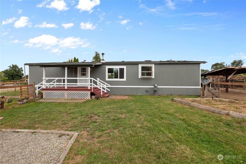 Photo of 17372 SE Lake Moneysmith Road, Auburn, WA 98092 (MLS # 2149451)
