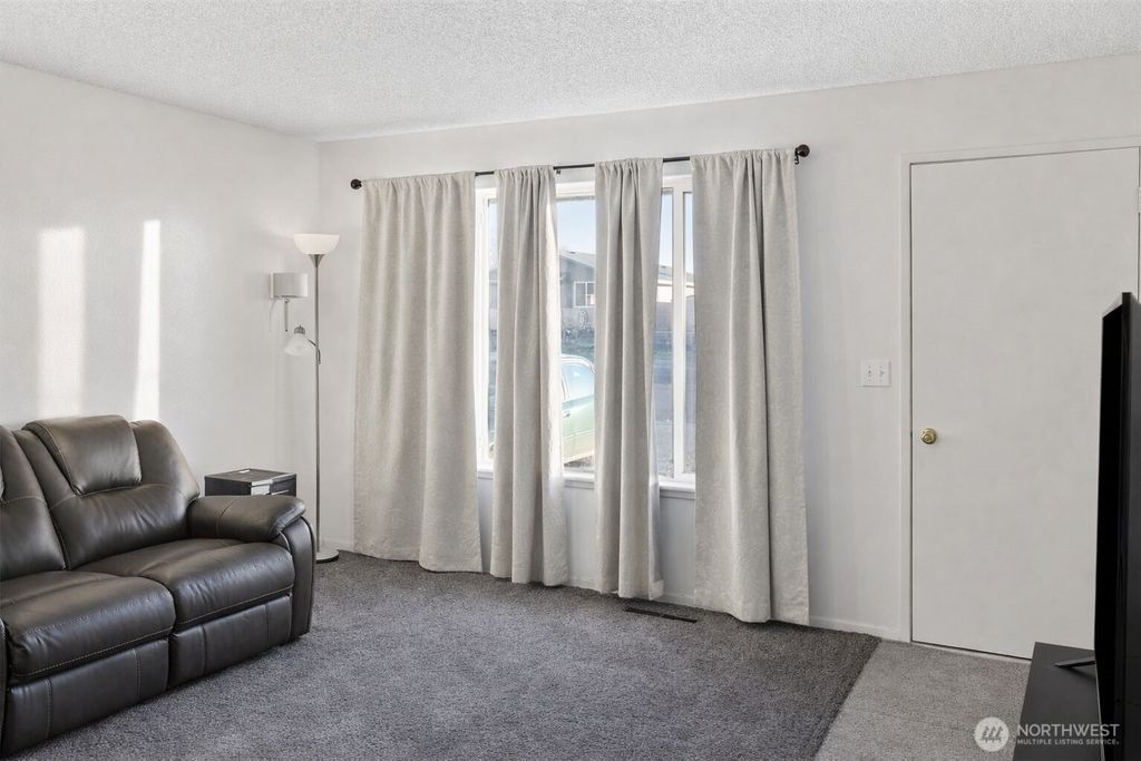 Photo of 205 E Cedar Street, Othello, WA 99344 (MLS # 2467294)