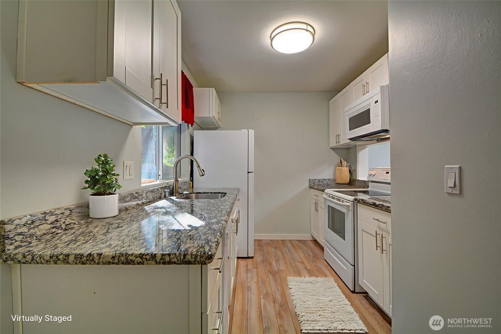 Photo of 4807 180th Street SW #E105, Lynnwood, WA 98037 (MLS # 2479739)