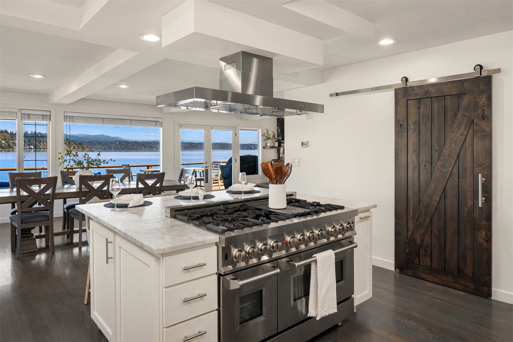 Photo of 8428 Island Drive S, Seattle, WA 98118 (MLS # 2592394)