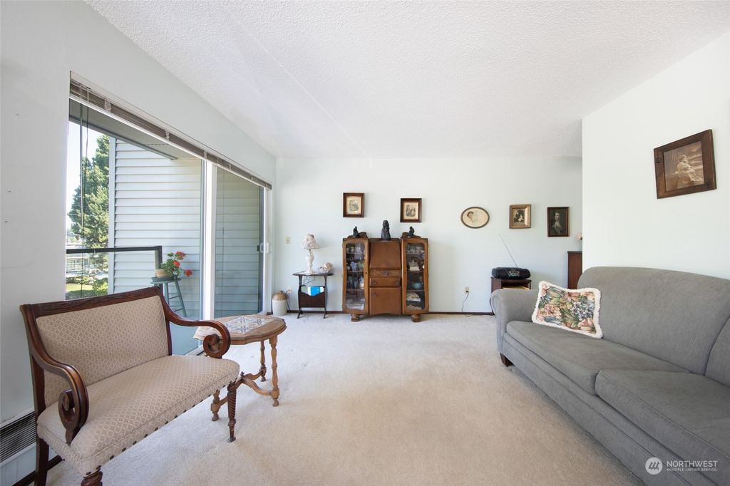 Photo of 2562 Thorndyke Avenue W #306, Seattle, WA 98199 (MLS # 2144420)