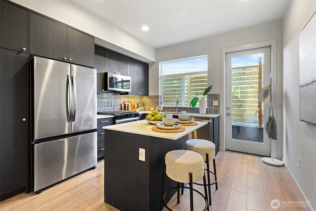 Photo of 9725 6th Avenue NW, Seattle, WA 98117 (MLS # 2435230)