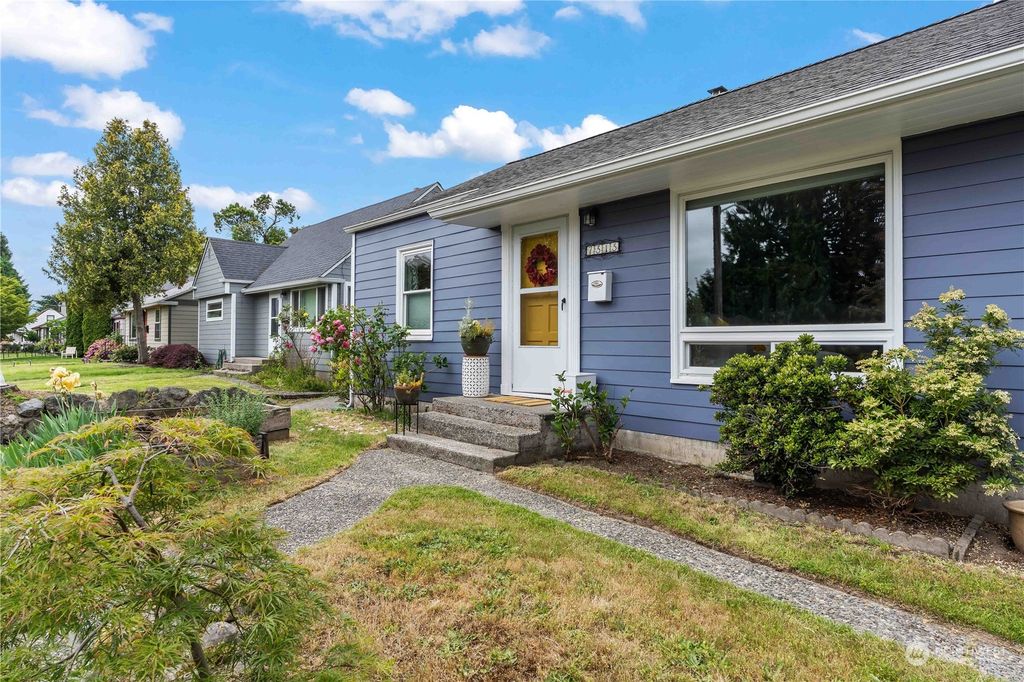 Photo of 7313 29th Avenue SW, Seattle, WA 98126 (MLS # 2074547)