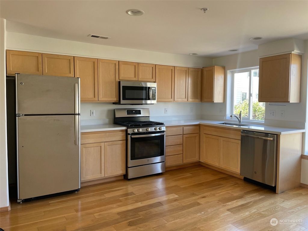 Photo of 3408 NE 65th Street #3, Seattle, WA 98115 (MLS # 2224816)