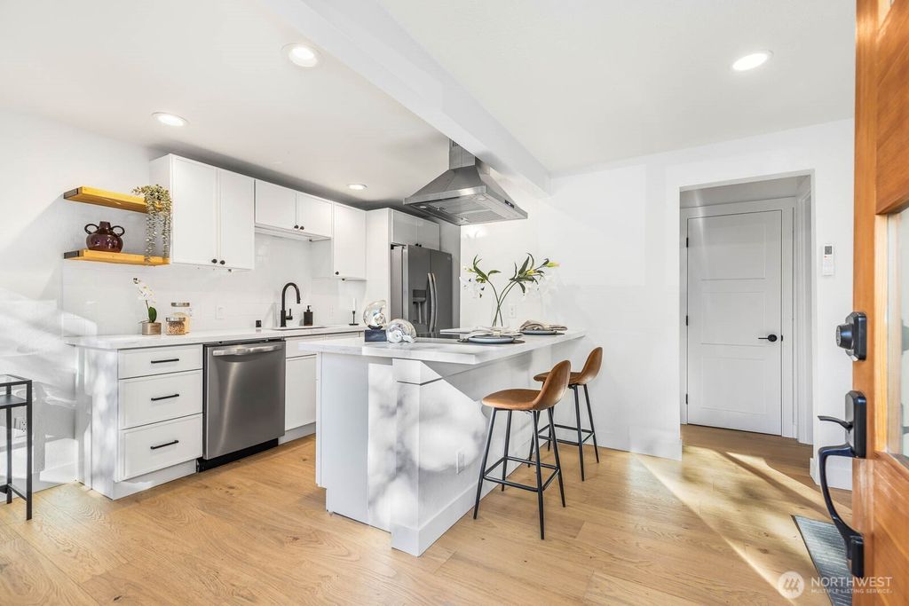 Photo of 1722 Martin Luther King Jr Way, Seattle, WA 98122 (MLS # 2427644)