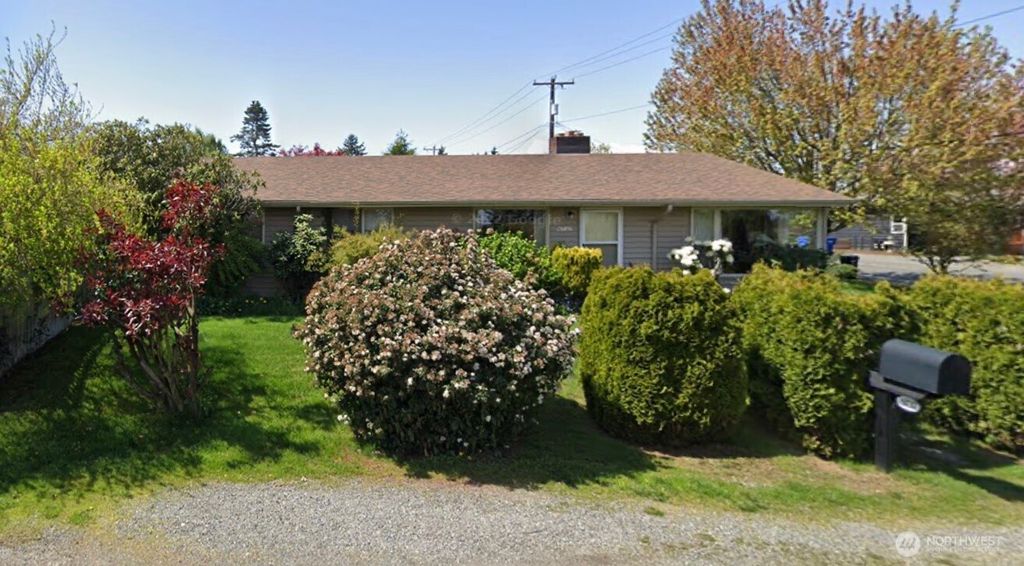 Photo of 9737 12th Avenue NW, Seattle, WA 98117 (MLS # 2383036)