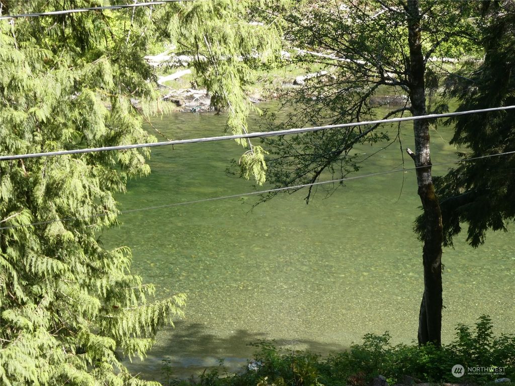 Photo of 52812 S Riverside Road, Gold Bar, WA 98251 (MLS # 2232316)