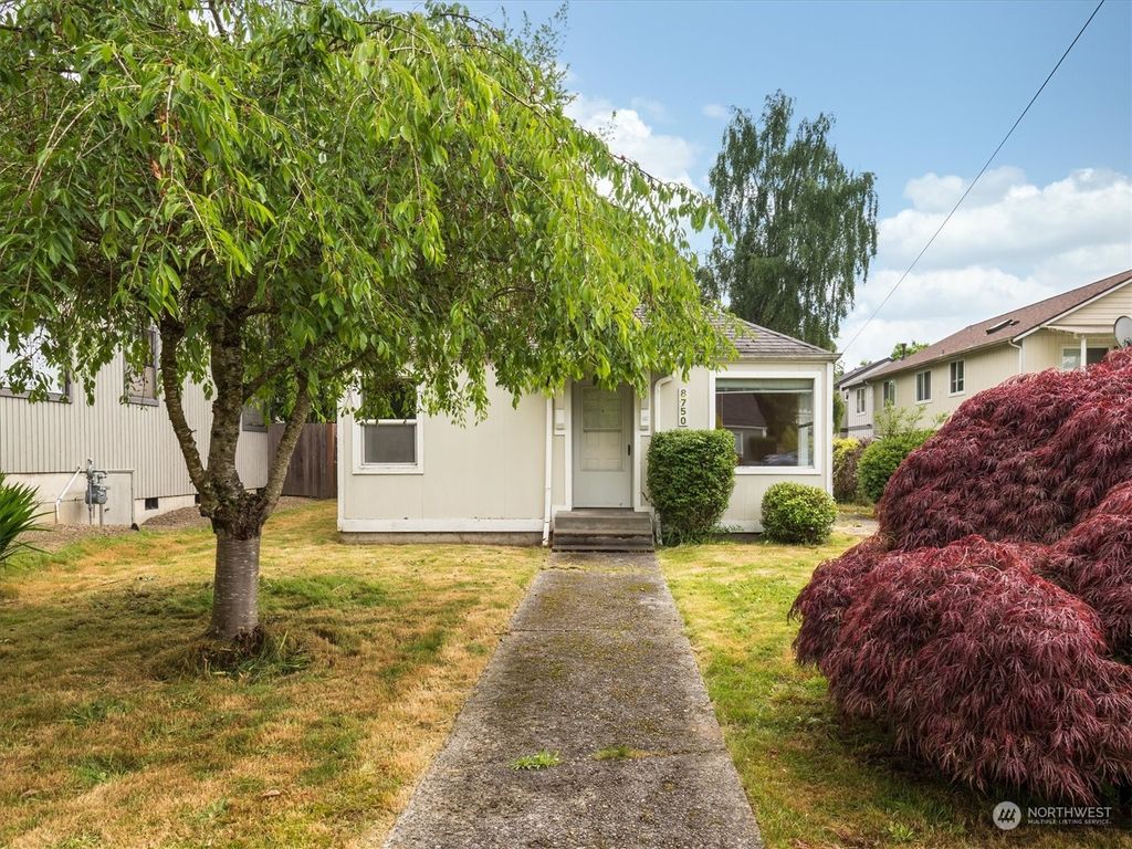 Photo of 8750 13th Avenue NW, Seattle, WA 98117 (MLS # 2073502)