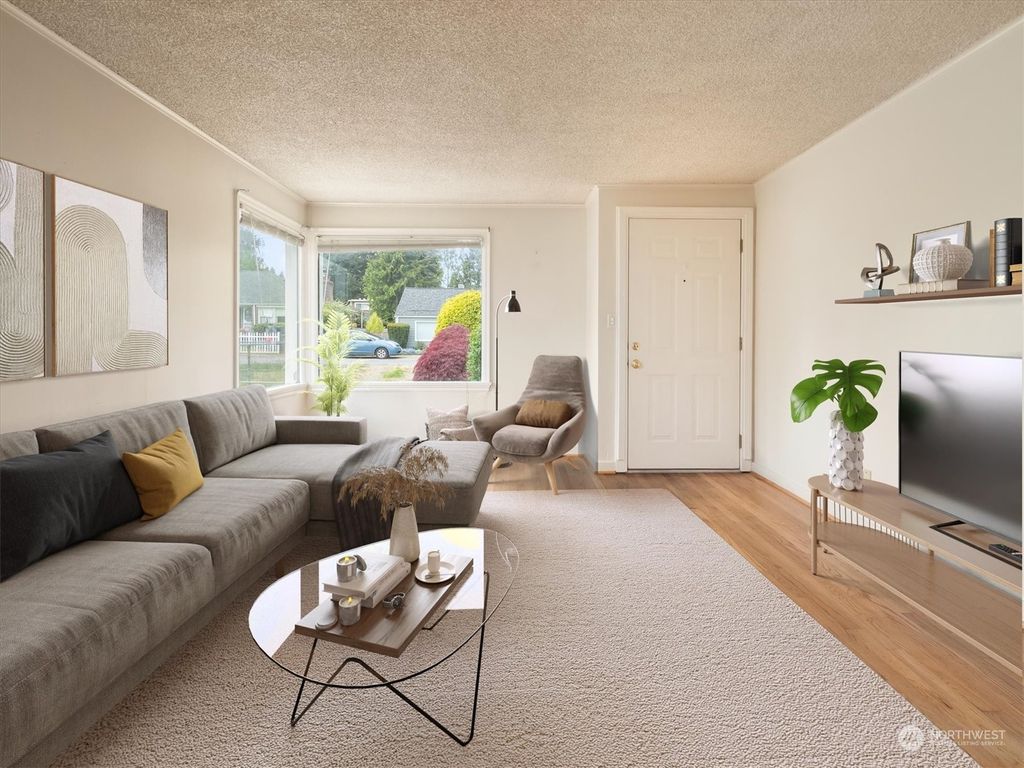 Photo of 8750 13th Avenue NW, Seattle, WA 98117 (MLS # 2073502)