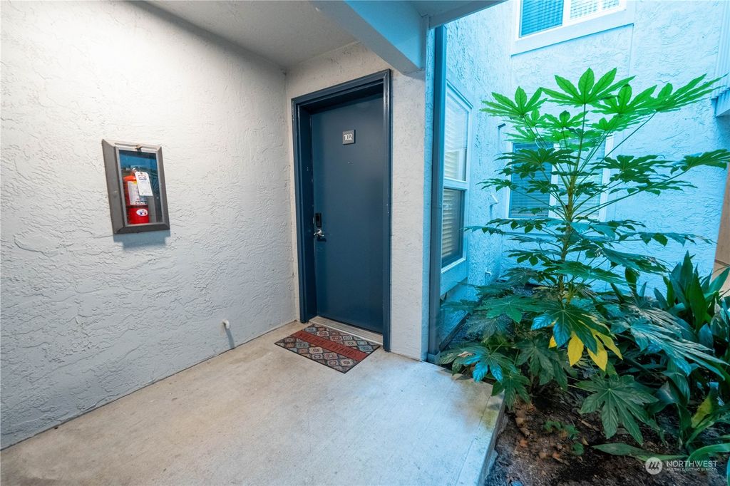 Photo of 6700 NE 182nd Street #A102, Kenmore, WA 98028 (MLS # 2132530)