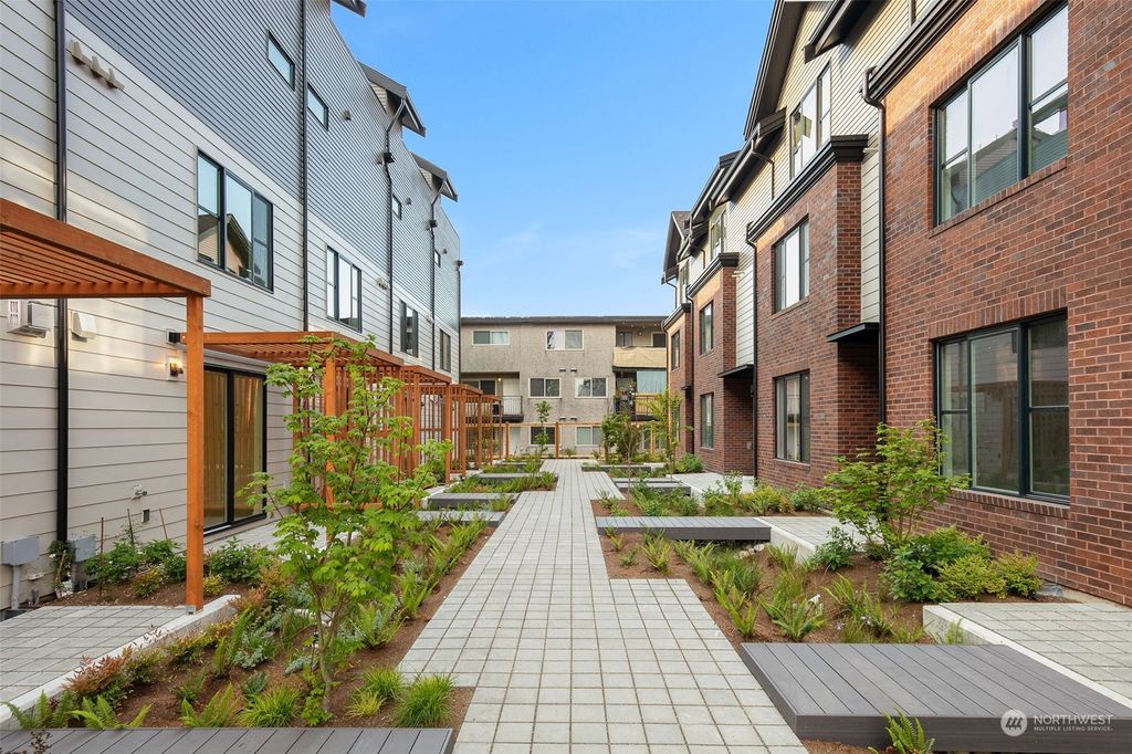 Photo of 8344 E (NC-5) 13th Avenue NW, Seattle, WA 98117 (MLS # 2137639)