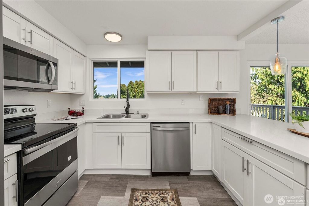 Photo of 5033 37th Street NE, Tacoma, WA 98422 (MLS # 2511025)