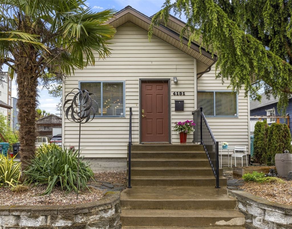 Photo of 4131 25th Avenue SW, Seattle, WA 98106 (MLS # 2226102)