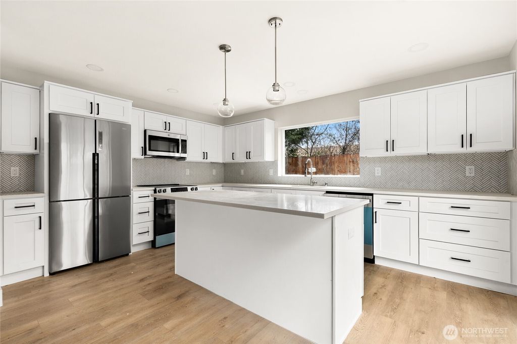 Photo of 1404 N 136th Street, Seattle, WA 98125 (MLS # 2502878)