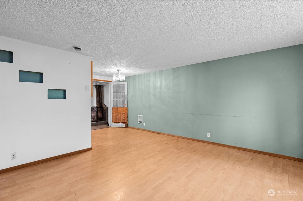 Photo of 12440 10th Avenue S, Seattle, WA 98168 (MLS # 2176329)