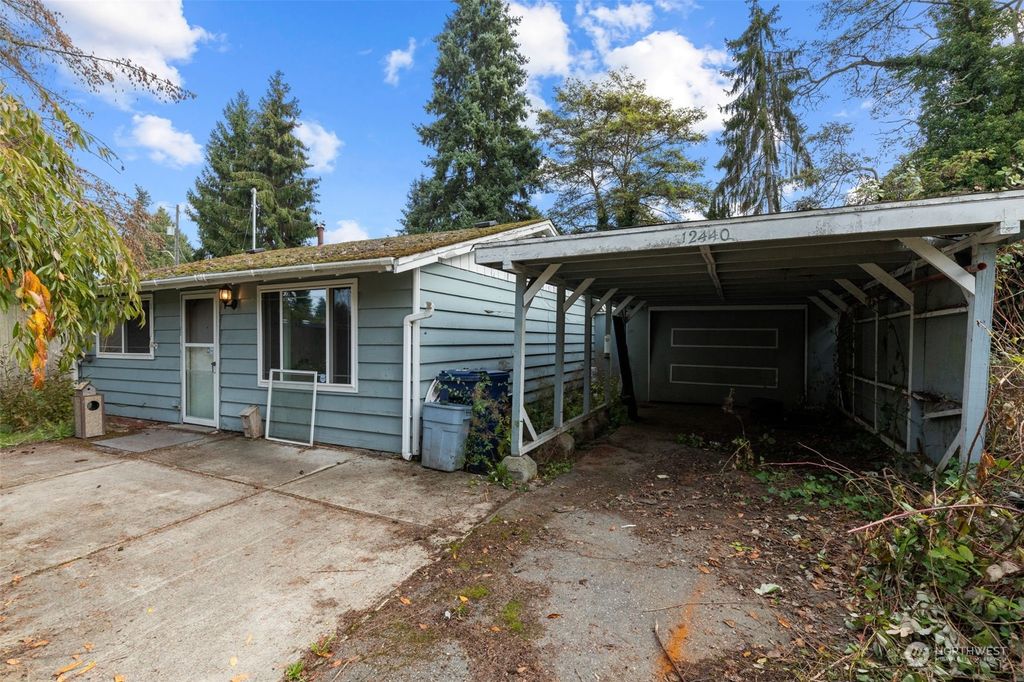 Photo of 12440 10th Avenue S, Seattle, WA 98168 (MLS # 2176329)