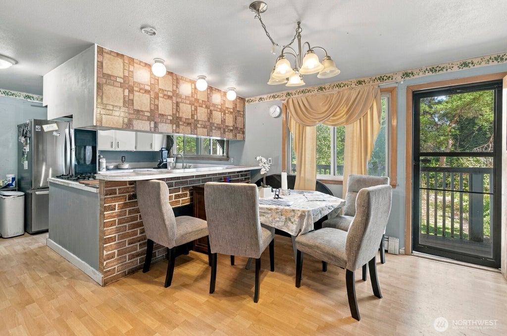 Photo of 2230 S 253rd Place, Des Moines, WA 98198 (MLS # 2589129)