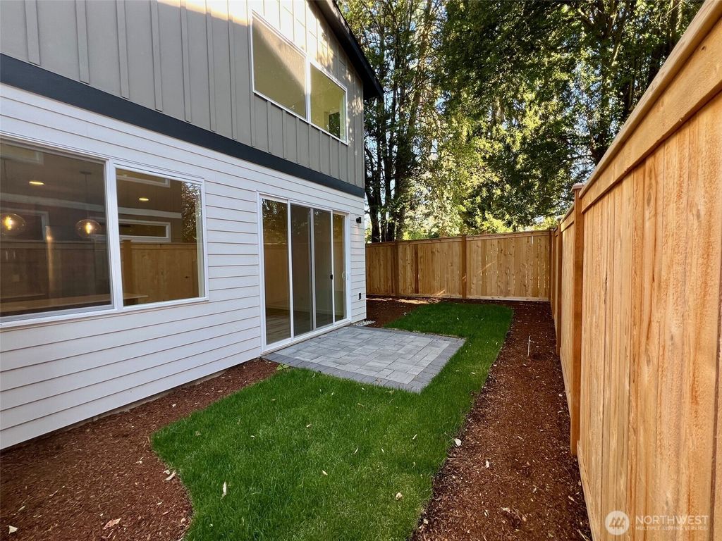 Photo of 9019 Dibble Avenue NW #B, Seattle, WA 98117 (MLS # 2407859)