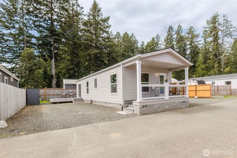 Photo of 60 NE Kappert Cove Road, Belfair, WA 98528 (MLS # 2510883)