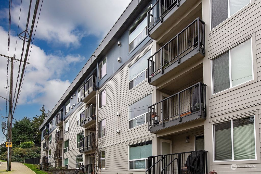 Photo of 9416 1st Avenue NE #101, Seattle, WA 98115 (MLS # 2322218)