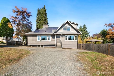 Photo of 11056 11th Avenue SW, Seattle, WA 98146 (MLS # 2442890)