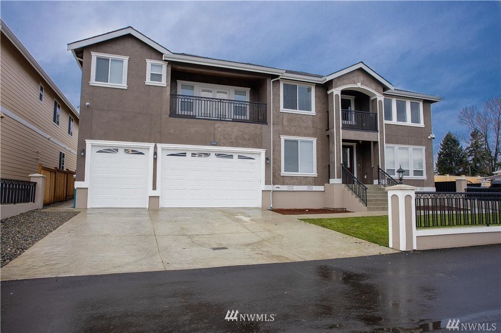 Photo of 4762 S 146th Street, Tukwila, WA 98168 (MLS # 1930381)