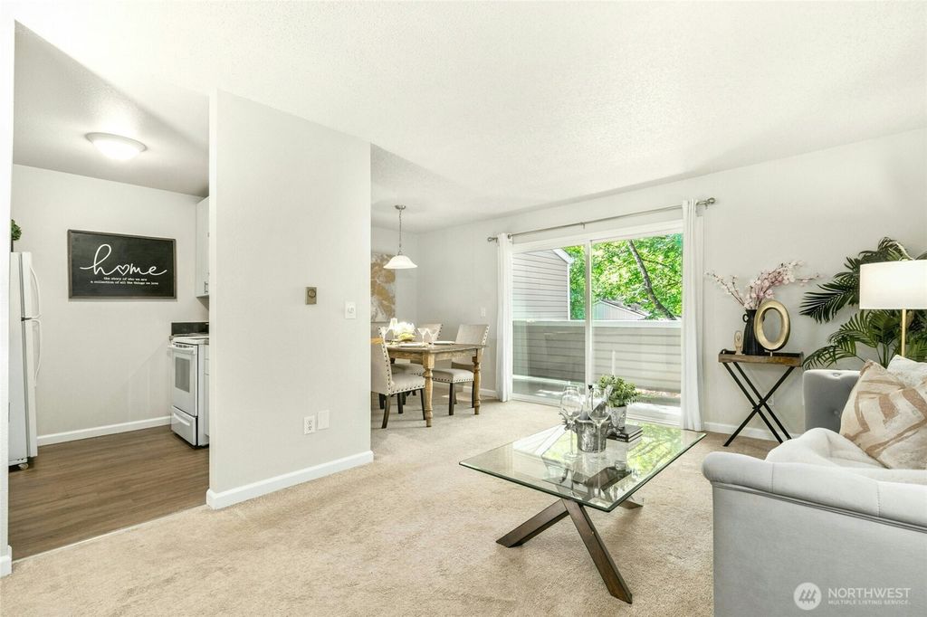 Photo of 12513 NE 130th Way #C204, Kirkland, WA 98034 (MLS # 2374451)