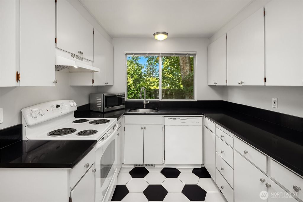 Photo of 7825 115th Avenue SE, Newcastle, WA 98056 (MLS # 2423132)