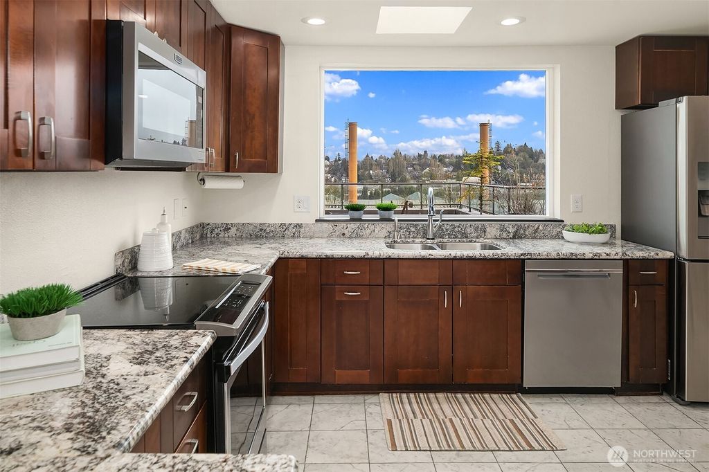 Photo of 3022 SW Bradford Street #401, Seattle, WA 98126 (MLS # 2426428)