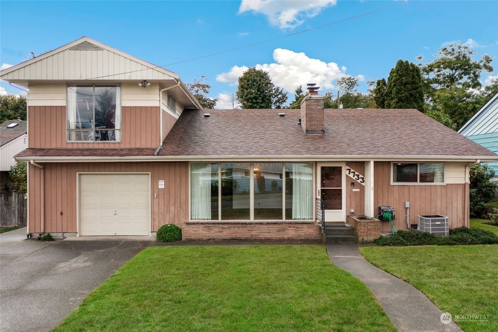 Photo of 7733 26th Avenue SW, Seattle, WA 98106 (MLS # 2170613)