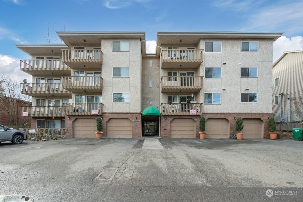 Photo of 12035 32nd Avenue NE #304, Seattle, WA 98125 (MLS # 2032296)