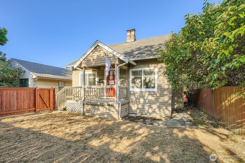 Photo of 5040 35th Avenue SW, Seattle, WA 98126 (MLS # 2413452)