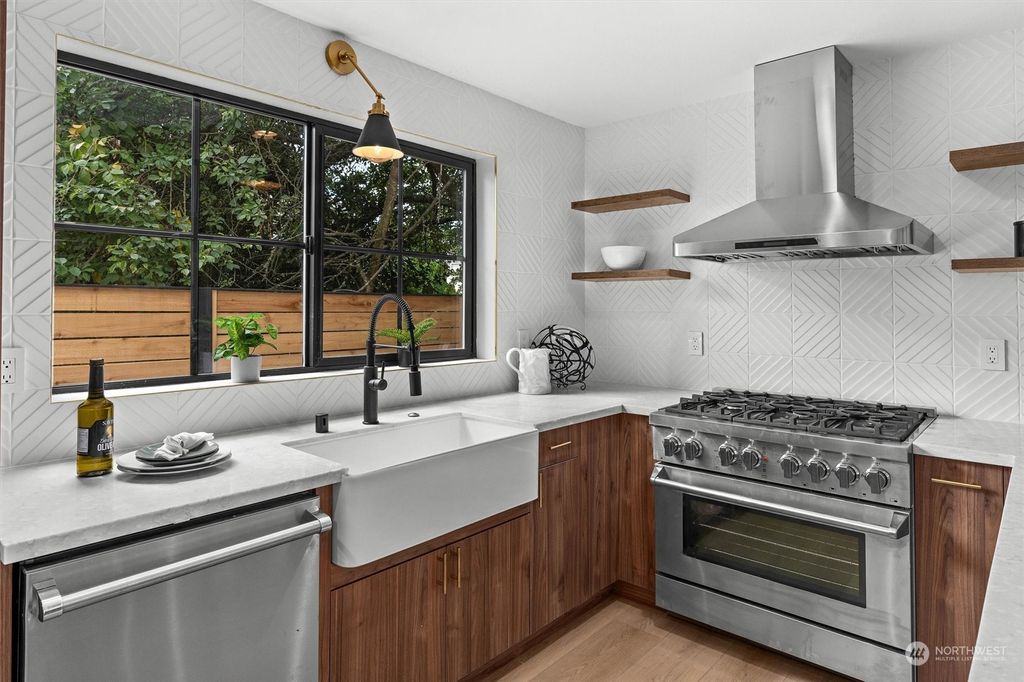 Photo of 8717 13th Avenue NW #B, Seattle, WA 98117 (MLS # 2159796)