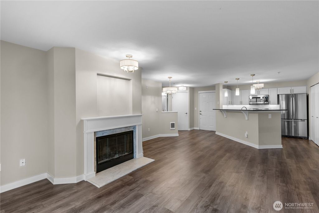 Photo of 7711 NE 175th Street #F104, Kenmore, WA 98028 (MLS # 2502951)