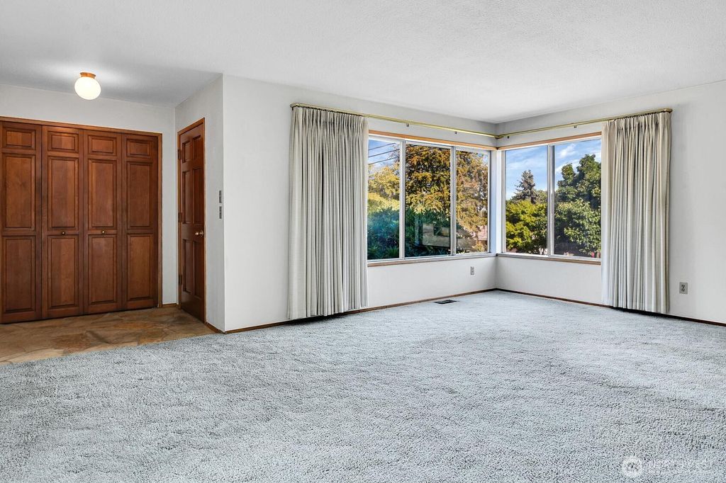 Photo of 7502 14th Avenue SW, Seattle, WA 98106 (MLS # 2419601)