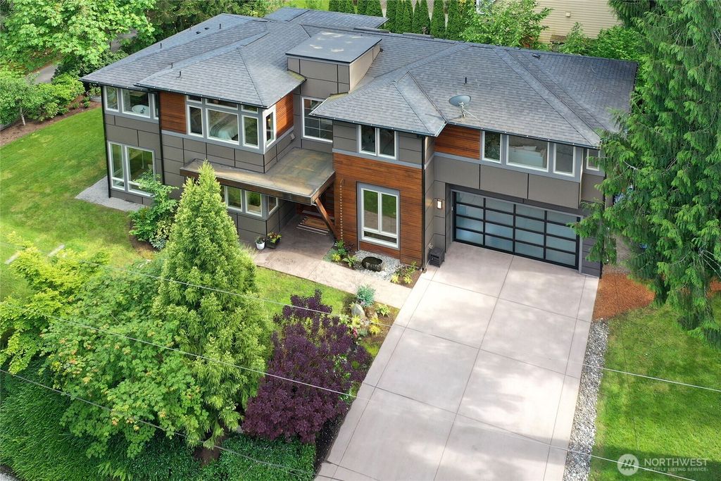 Photo of 8587 Springridge Road NE, Bainbridge Island, WA 98110 (MLS # 2514000)