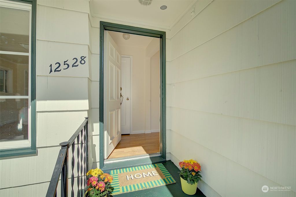 Photo of 12528 24th Avenue NE, Seattle, WA 98125 (MLS # 2217953)