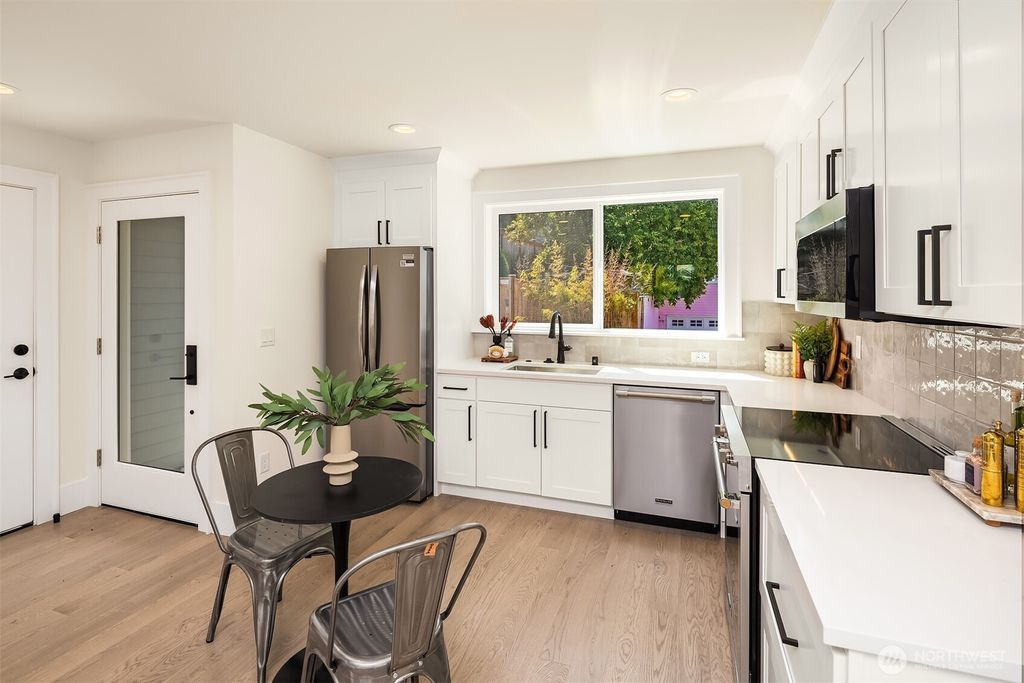 Photo of 2137 N 62nd Street, Seattle, WA 98103 (MLS # 2411002)