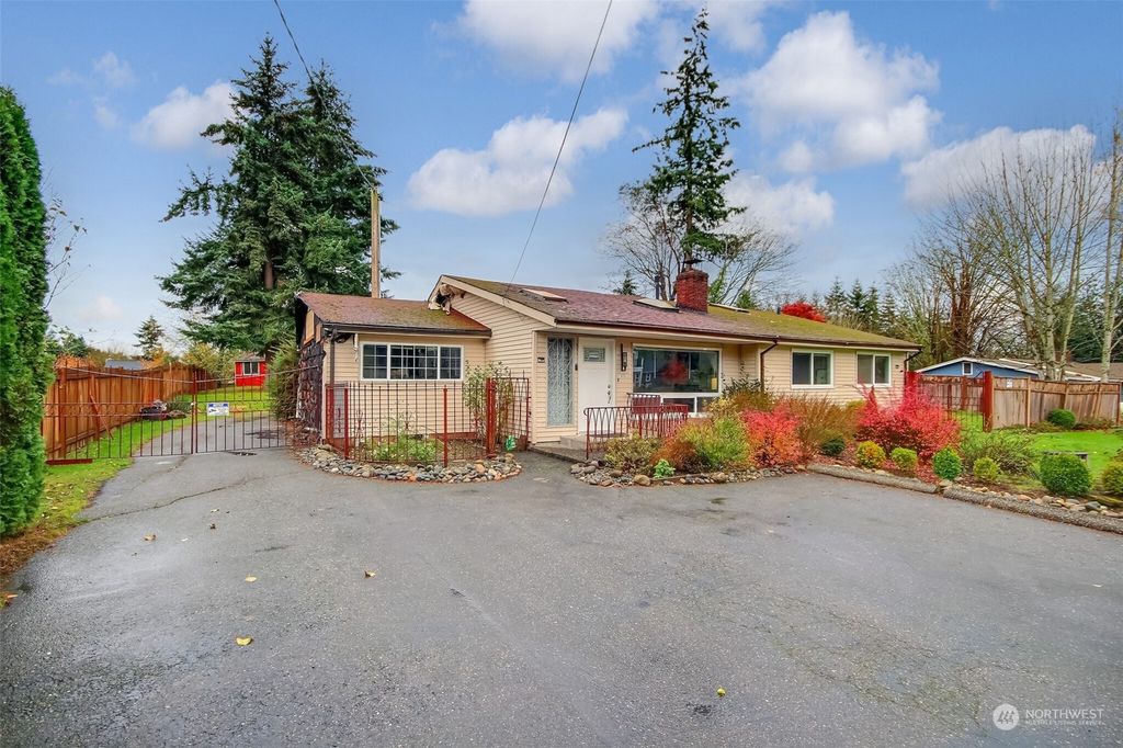 Photo of 835 SW 312th Street, Federal Way, WA 98023 (MLS # 2311028)