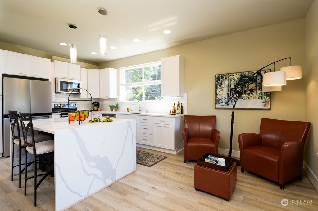 Photo of 12015 9th Avenue NW #1, Seattle, WA 98177 (MLS # 2142051)