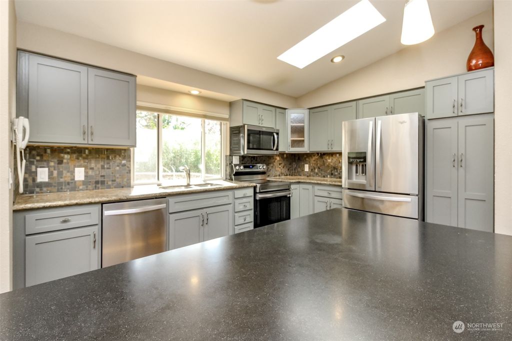 Photo of 33906 28th Place SW, Federal Way, WA 98023 (MLS # 2289375)