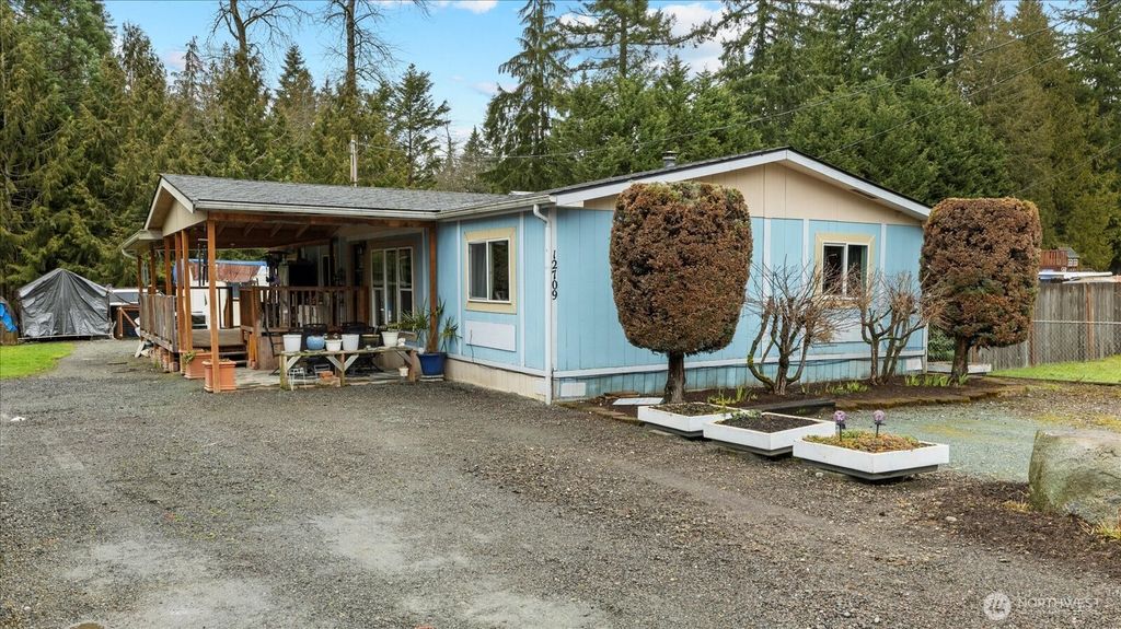 Photo of 12709 218th Pl Pl SE, Snohomish, WA 98296 (MLS # 2334218)