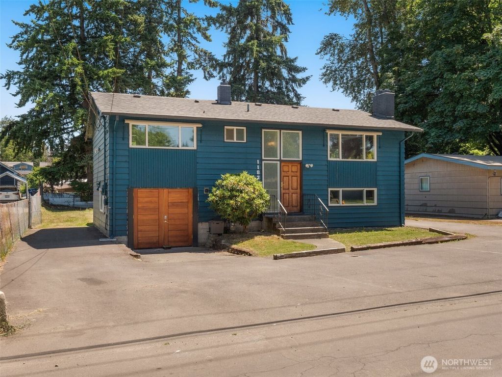 Photo of 11822 10th Avenue S, Seattle, WA 98168 (MLS # 2384645)
