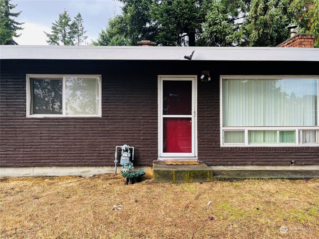 Photo of 16921 31st Place S, Seattle, WA 98188 (MLS # 2165039)